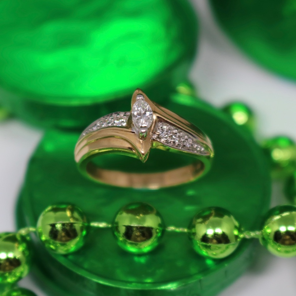 14K gold marquise diamond ring.